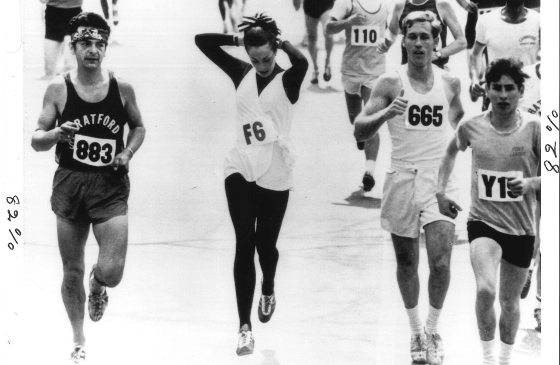 switz-tying-up-hair-hi-res